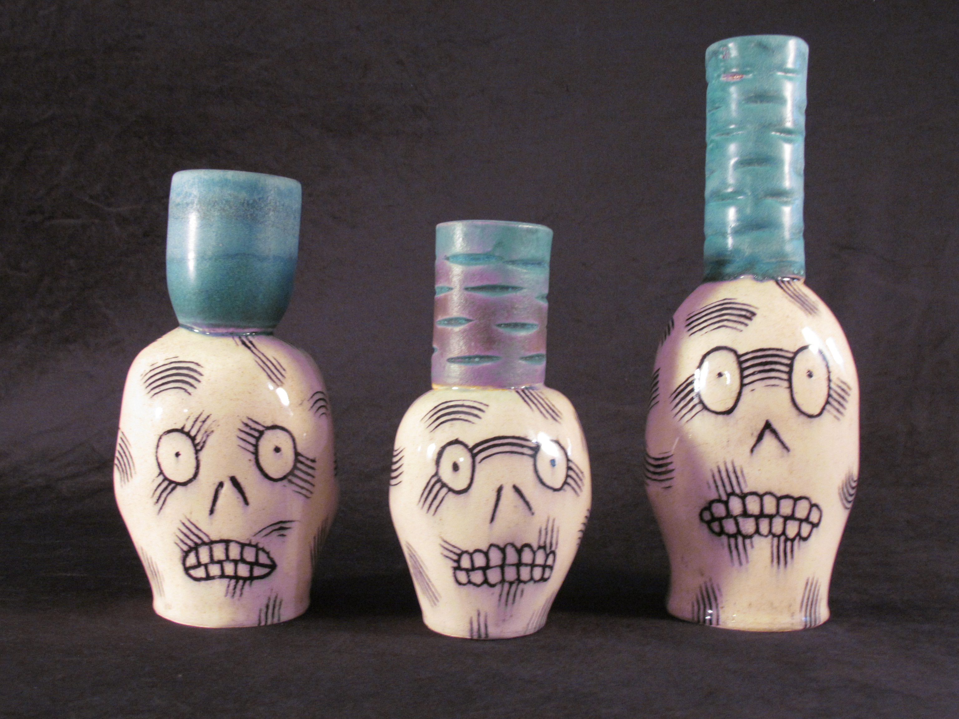 3 Skull Vases