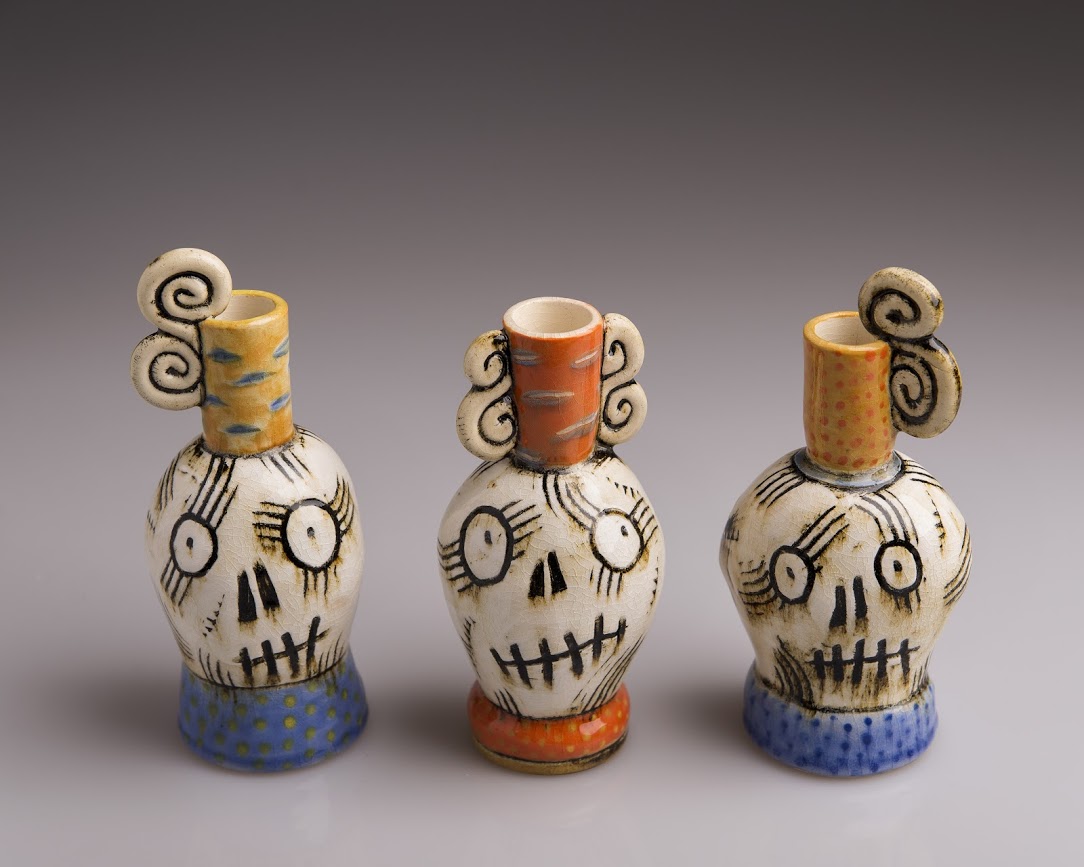 3 Skull Vases